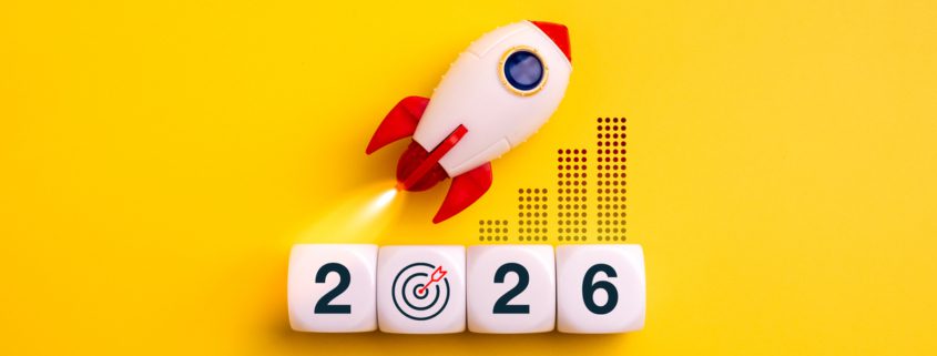 Rocket launching above 2026 cubes with target icon and growth graph on yellow background, symbolizing business startup, creative market, innovation strategy, new year goals, and future success.