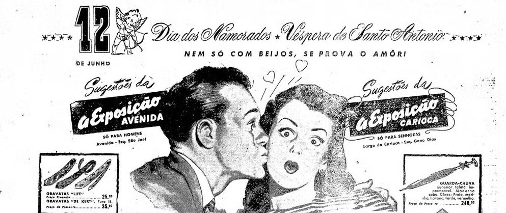 Anúncio publicitário em preto e branco de 10 de junho de 1949 para o Dia dos Namorados. No centro, um homem tenta beijar uma mulher surpresa. No topo aparece a frase “Nem só com beijos se prova o amor!”, acompanhada de ofertas de presentes das lojas Exposição Avenida e Exposição Carioca.