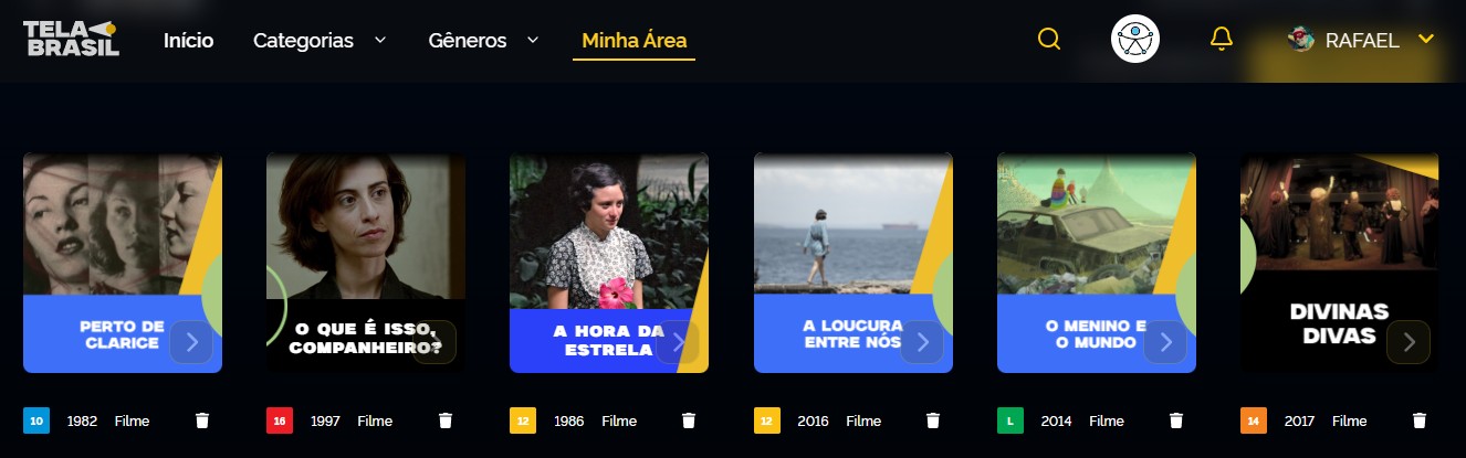 Captura de tela da área pessoal da plataforma de streaming gratuita Tela Brasil. A página exibe uma seleção de filmes brasileiros salvos pelo usuário, com títulos como Perto de Clarice, O Que É Isso, Companheiro?, A Hora da Estrela e Divinas Divas, organizados em cartões com capa, ano de lançamento e classificação indicativa.